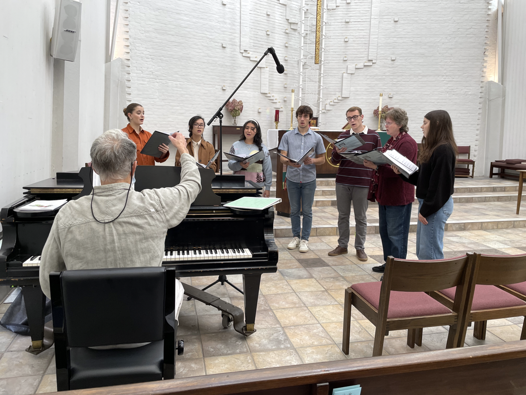 Photo of the St. Mark's Chapel Choir practicing the song, 